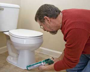 Greg is installing a new toilet
